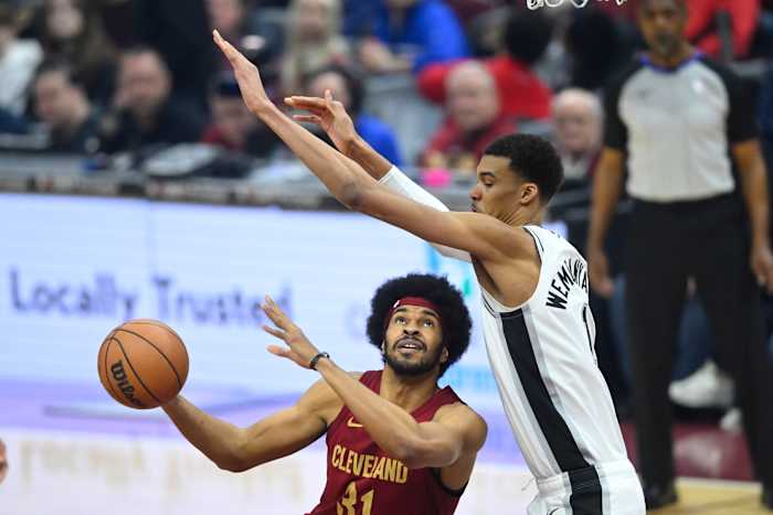 Jan 7, 2024; Cleveland, Ohio, USA; Cleveland Cavaliers center Jarrett Allen (31) looks to shoot beside San Antonio Spurs center Victor Wembanyama (1) in the first quarter at Rocket Mortgage FieldHouse.